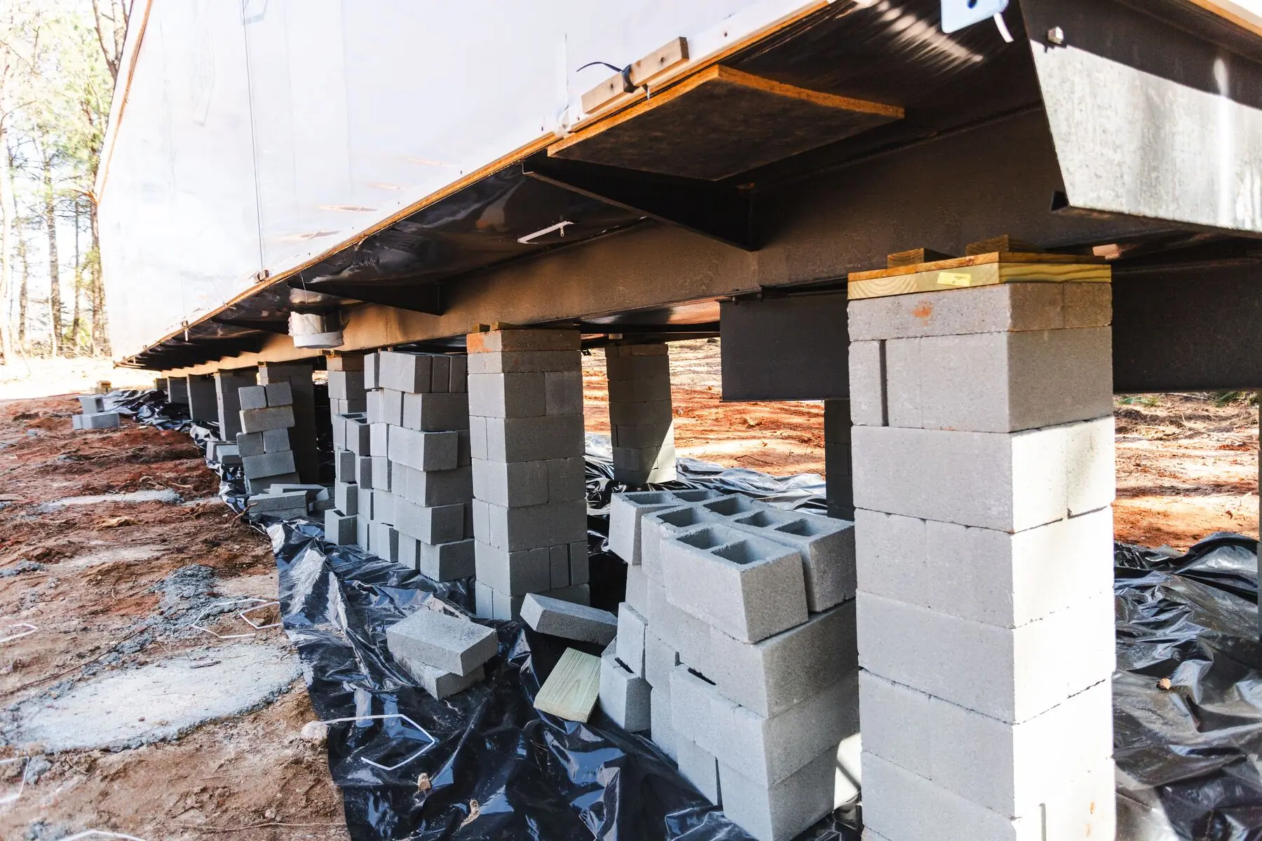 Concrete block piers under home.