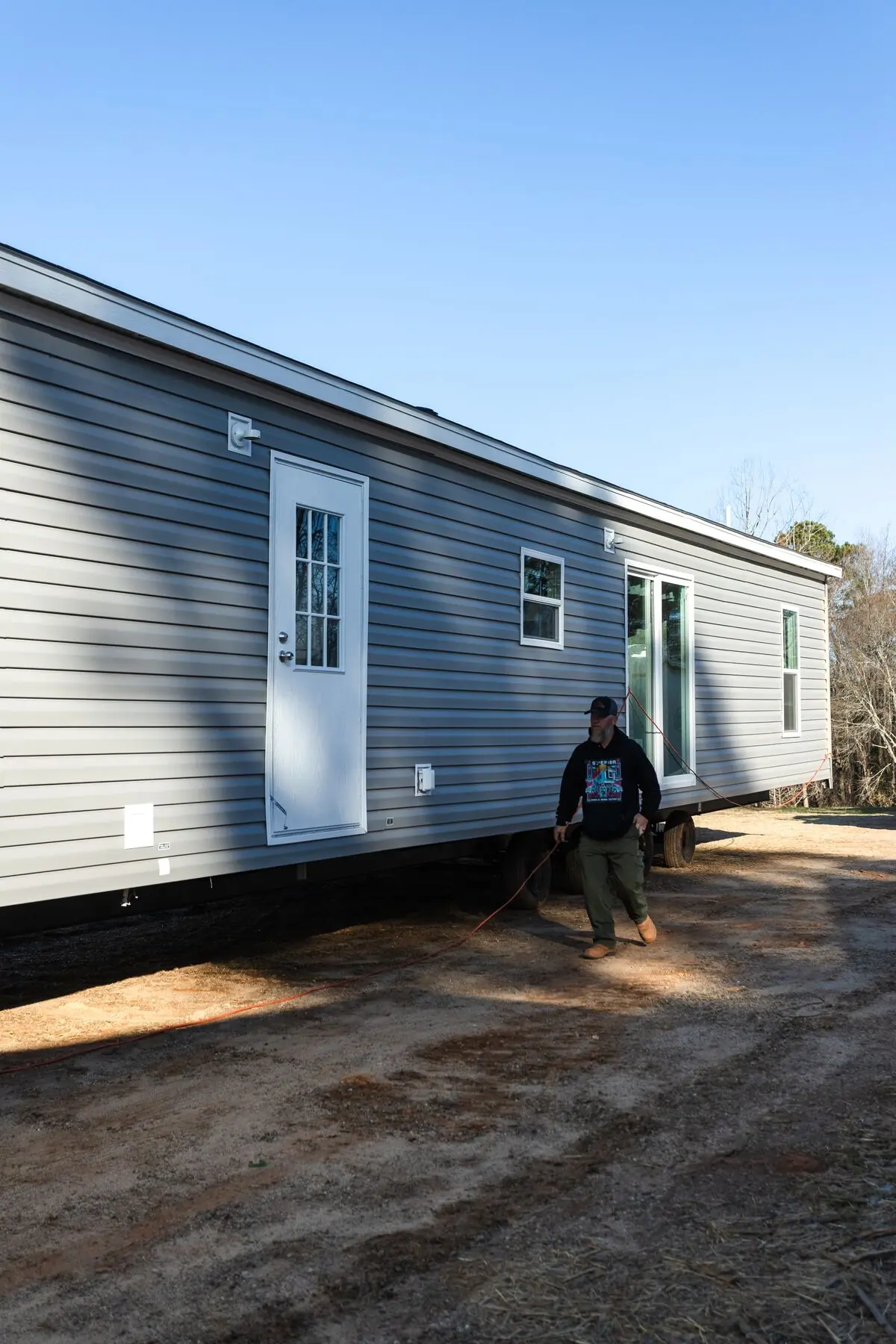 Crew member beside home section.