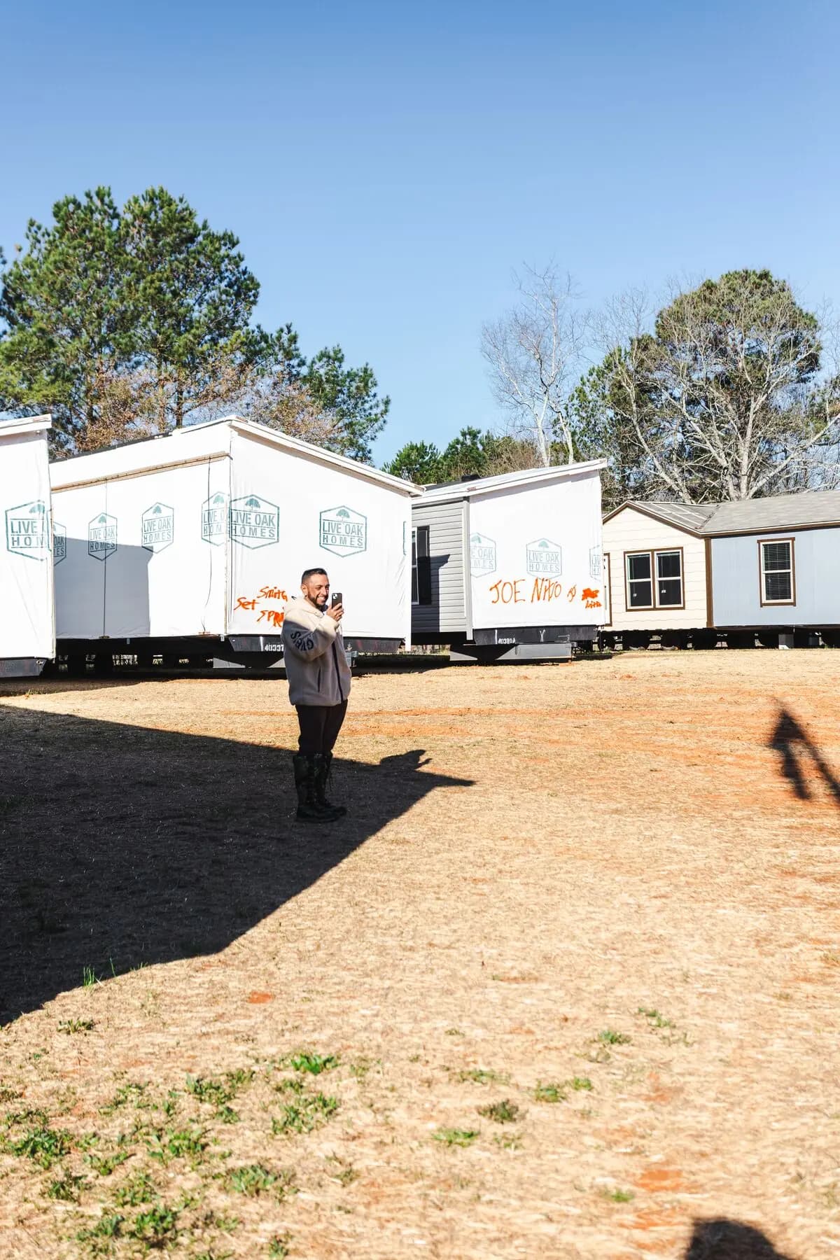 Crew staging manufactured home sections.