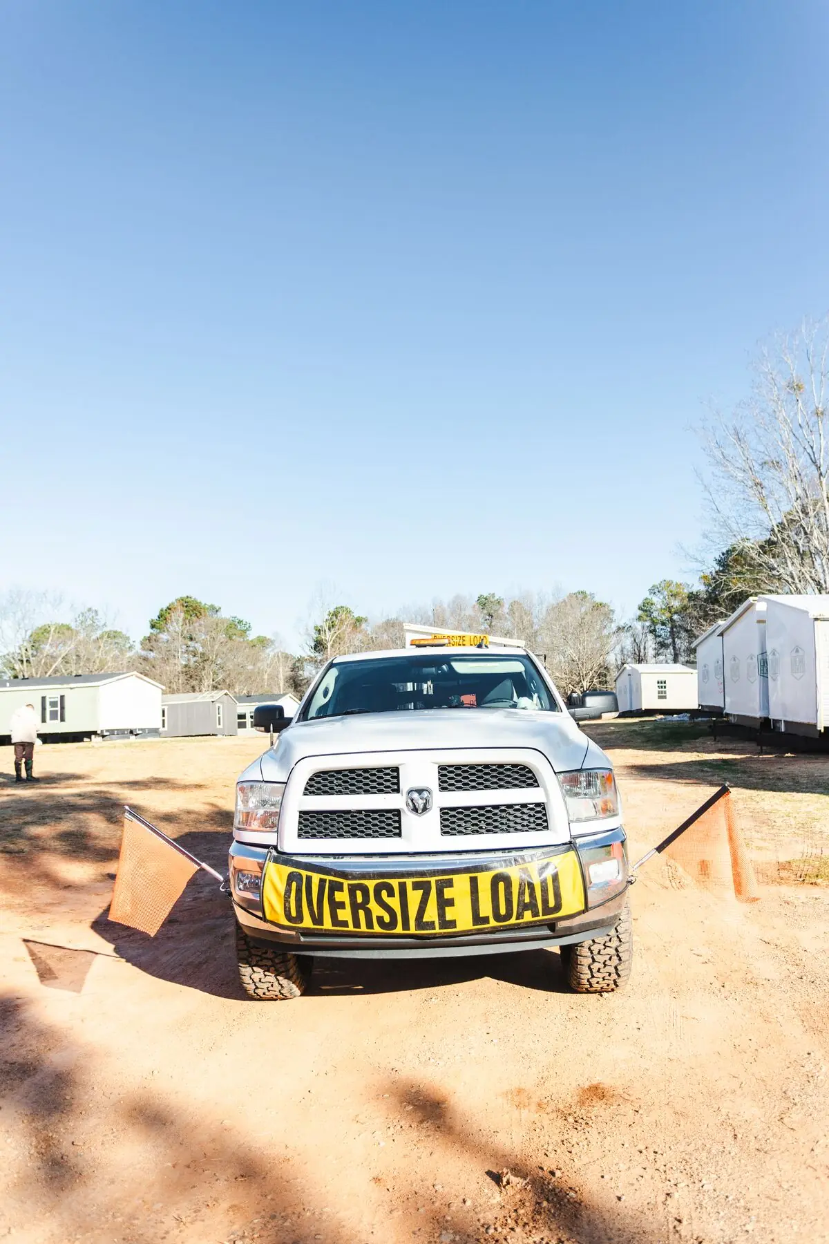 Escort truck oversize load sign.
