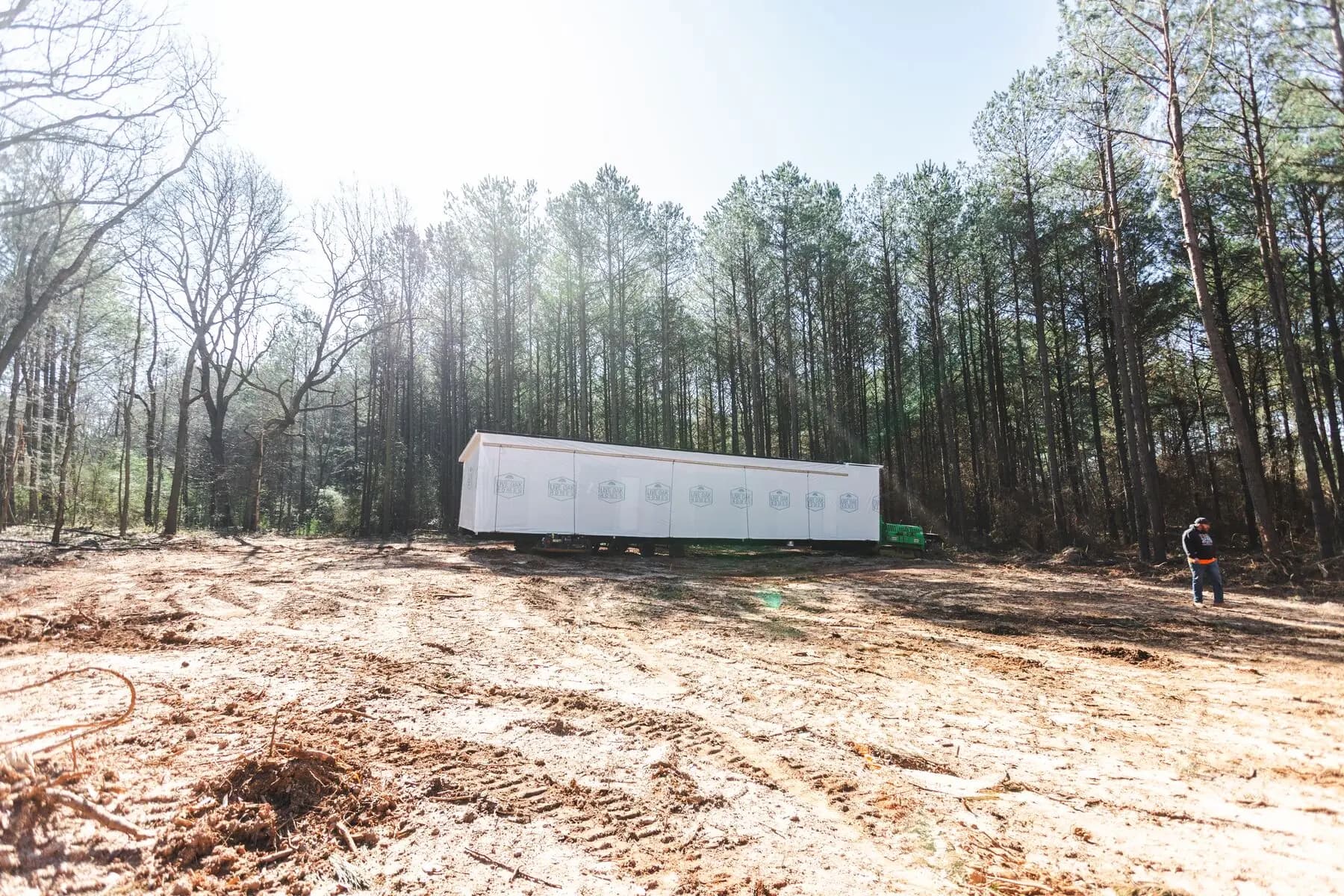 Home section positioned in cleared site.