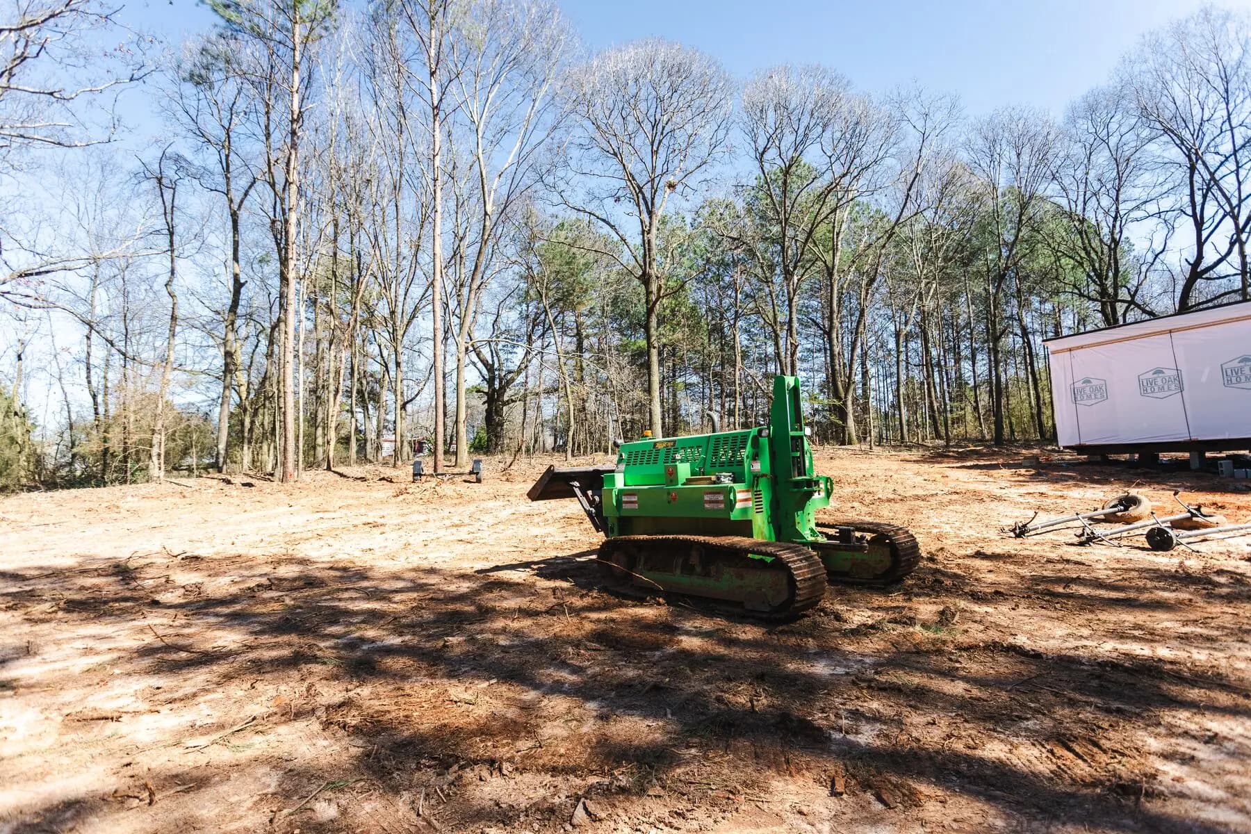 House tug grading around home site.