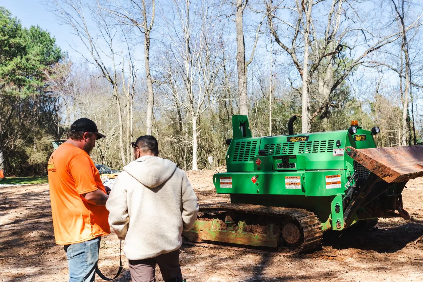 House tug operator and site crew.