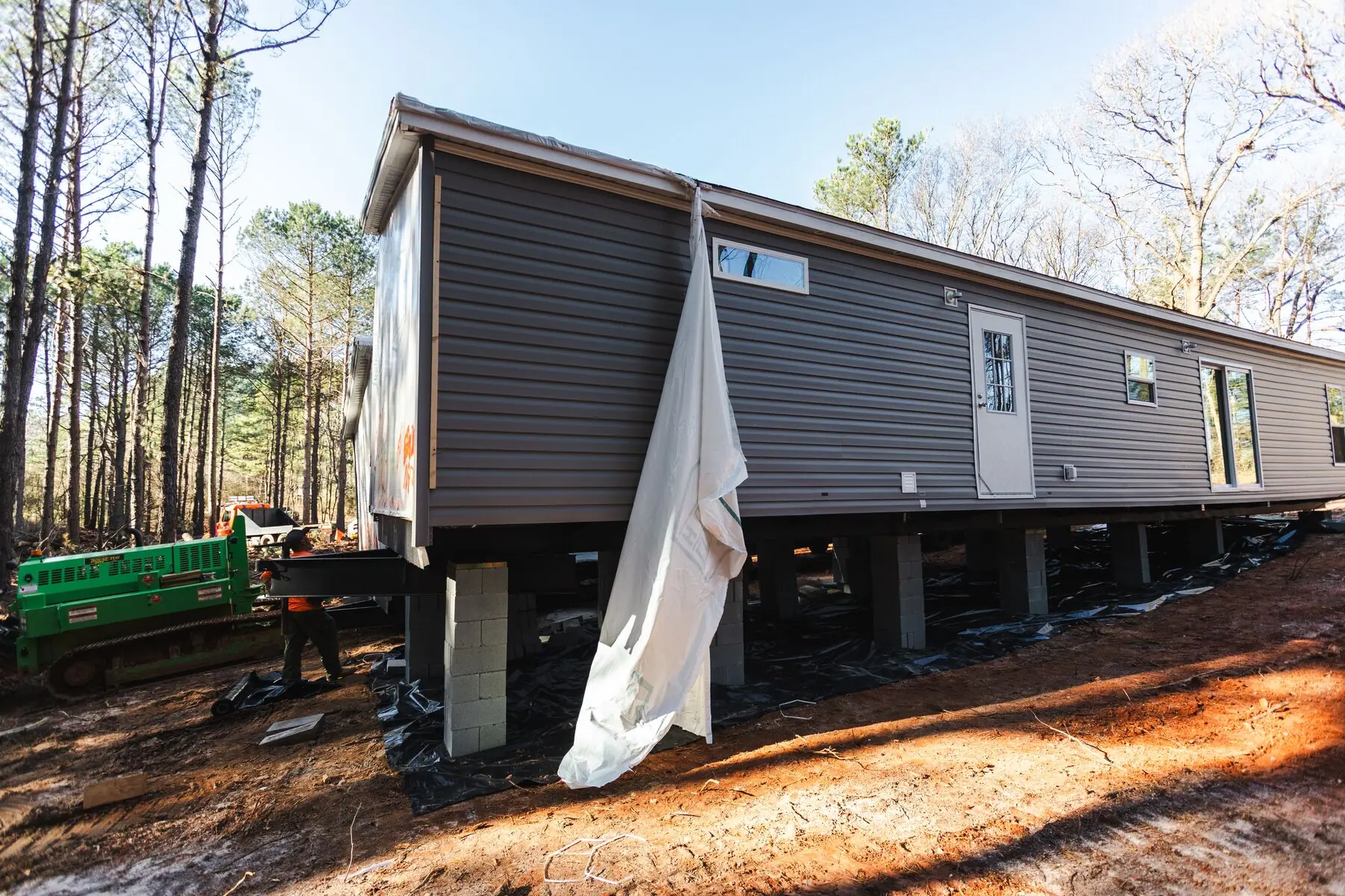 Manufactured home supported on piers.