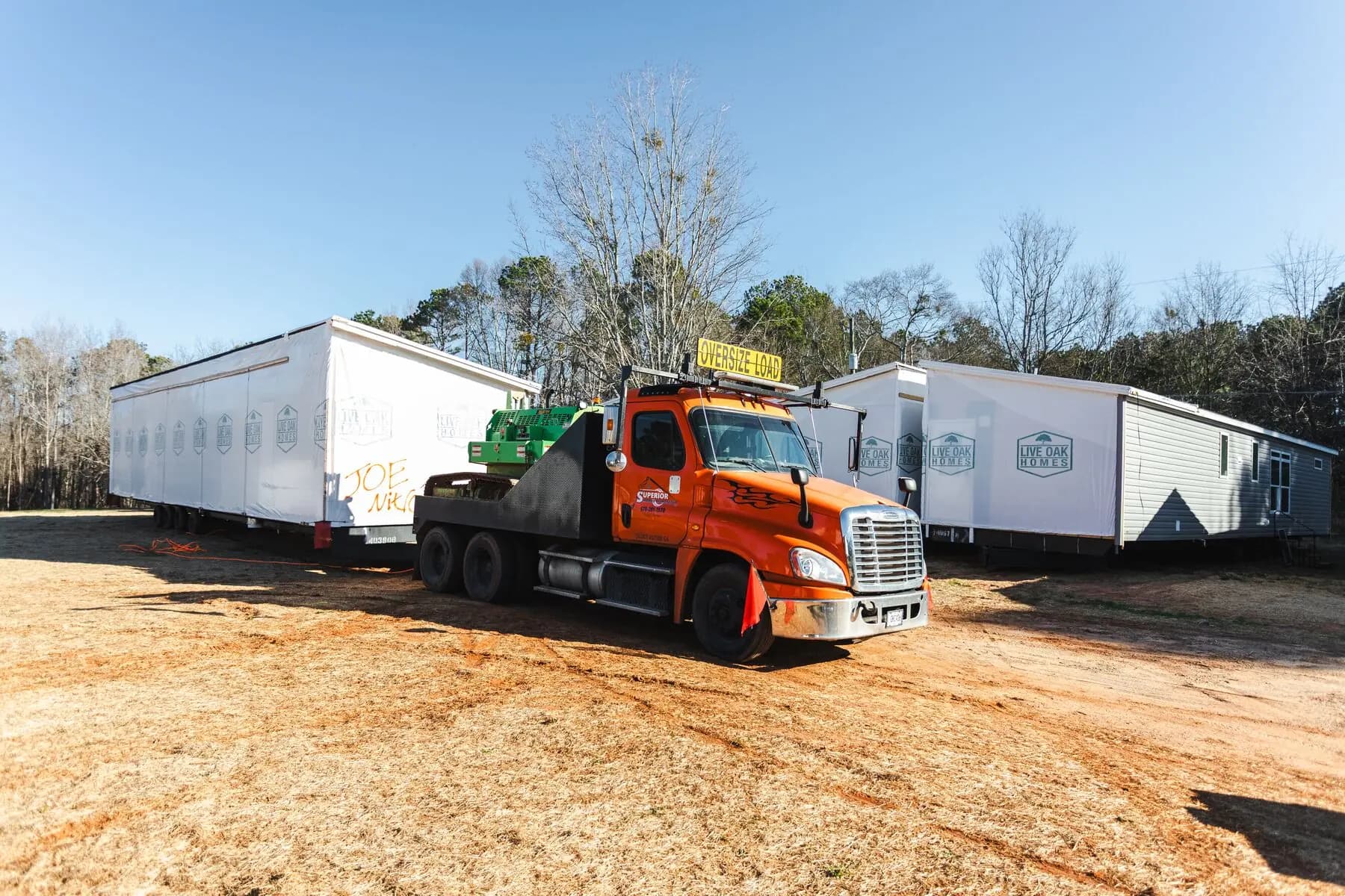 Manufactured home transport truck and section.