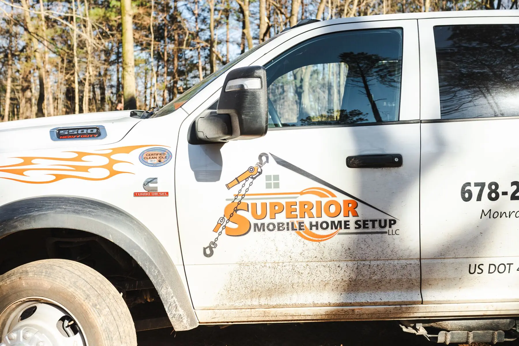 Superior mobile home setup truck logo.
