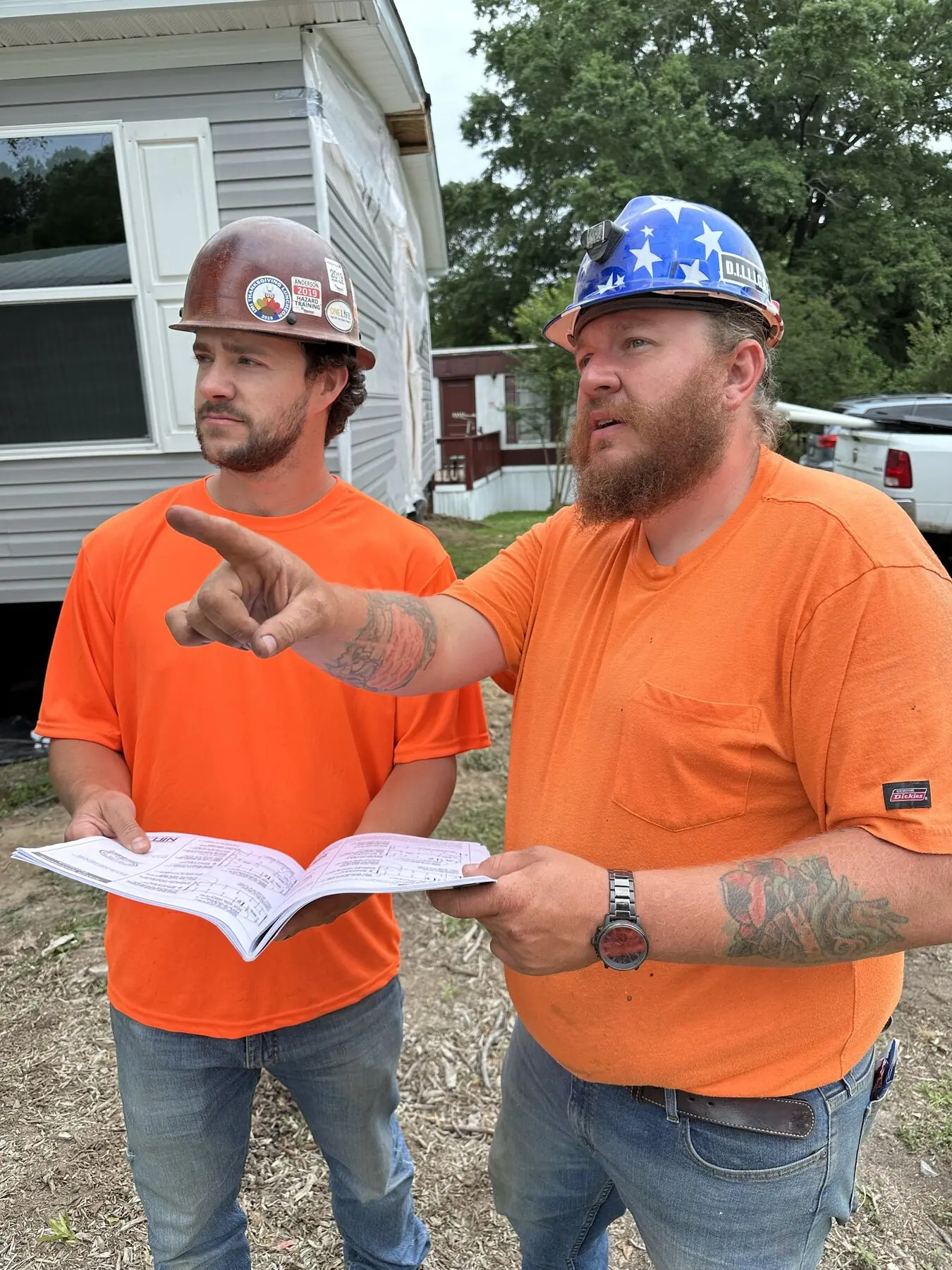 Superior team reviewing site plans.