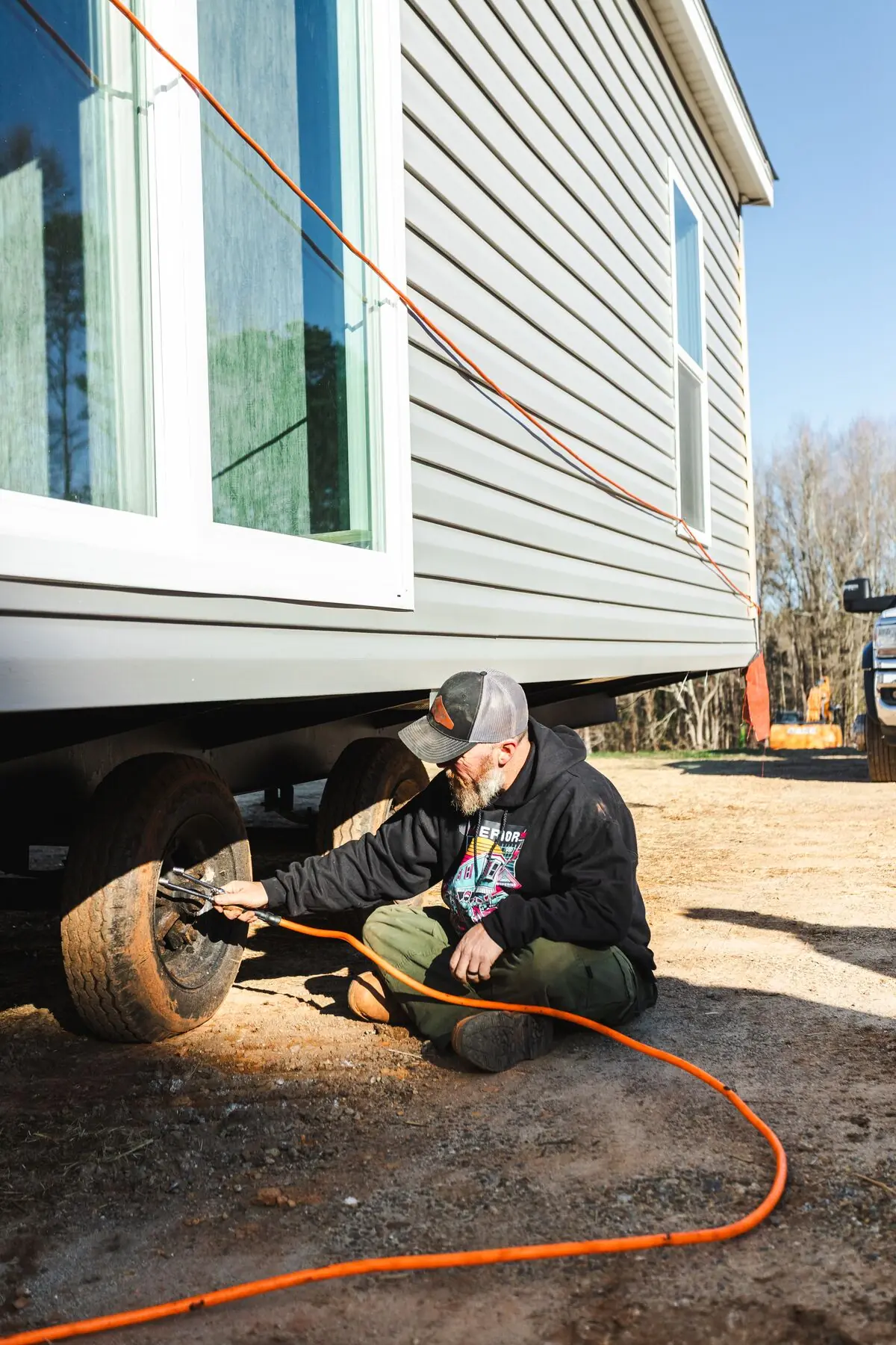 Technician preparing home tire.