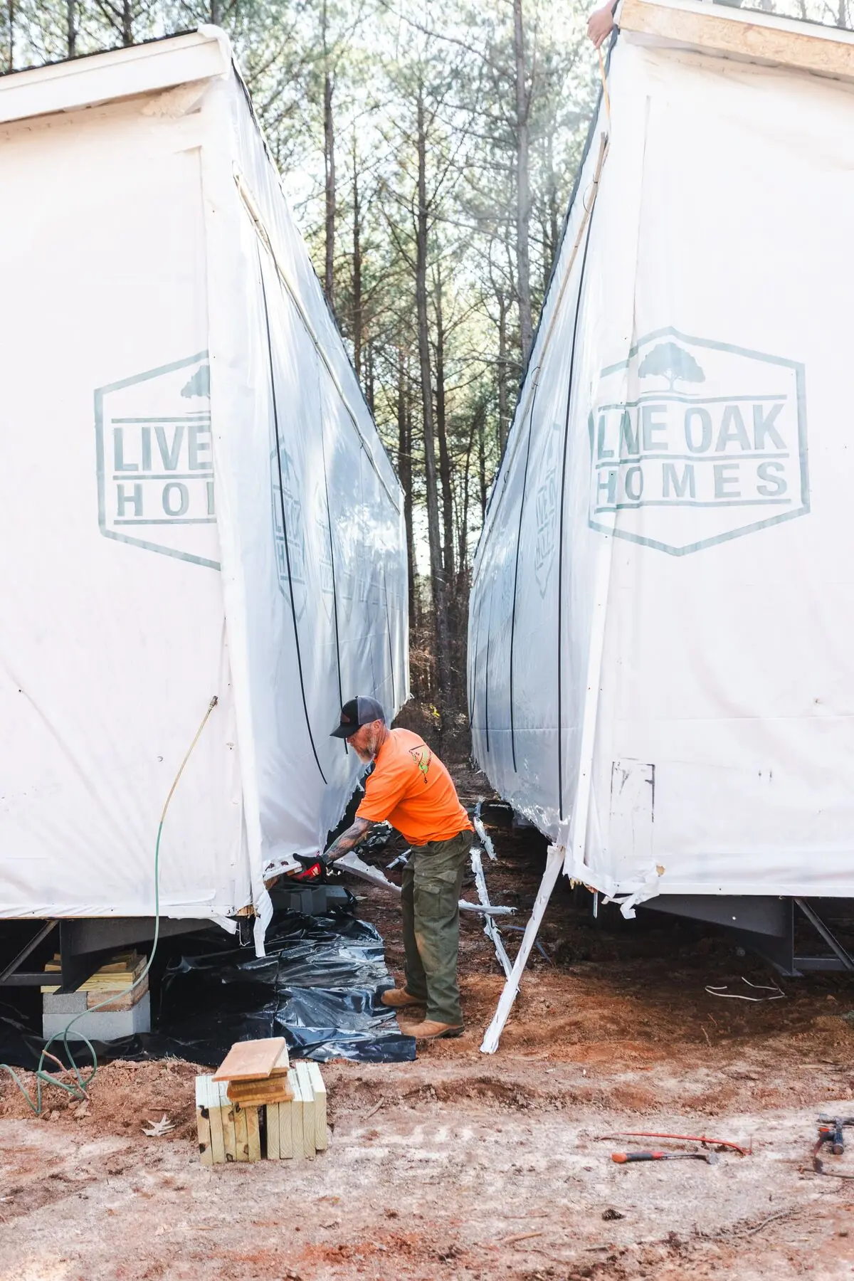 Worker sealing double wide centerline.