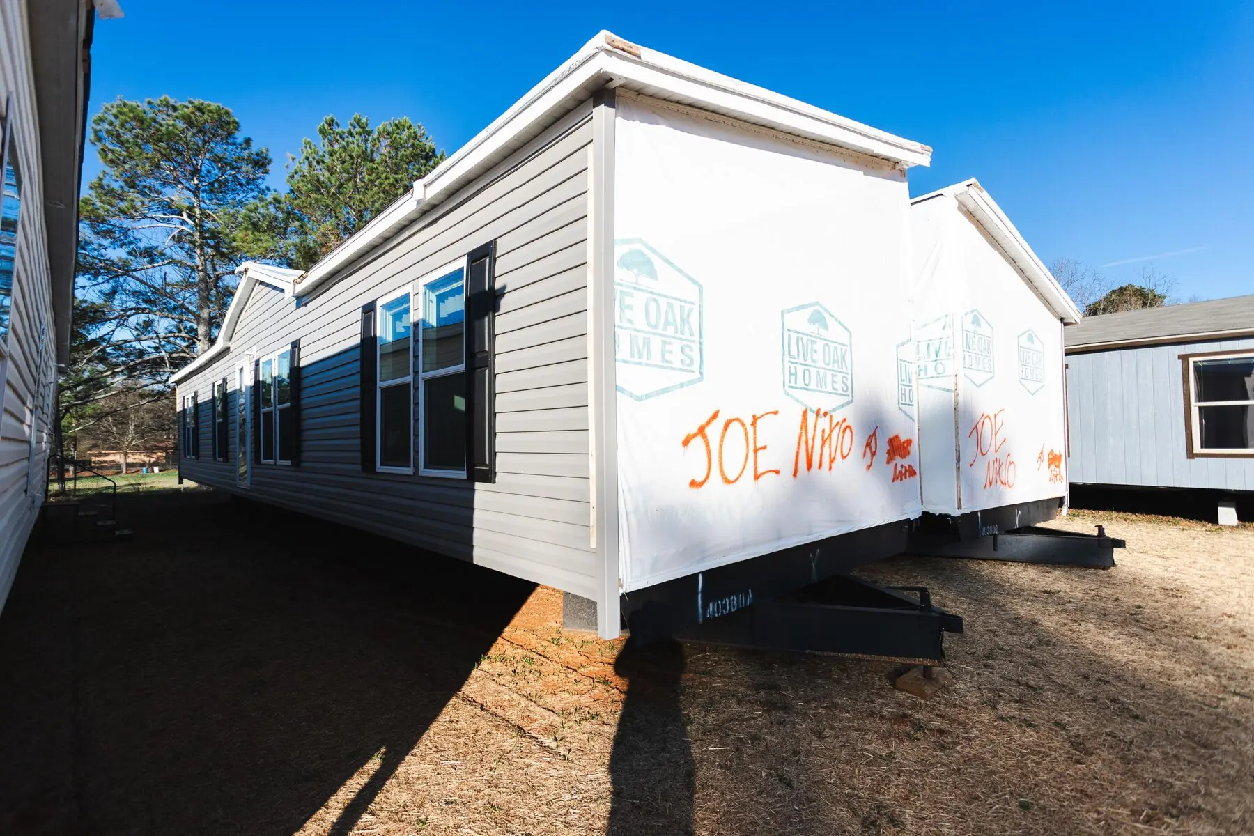 Wrapped manufactured home section end.